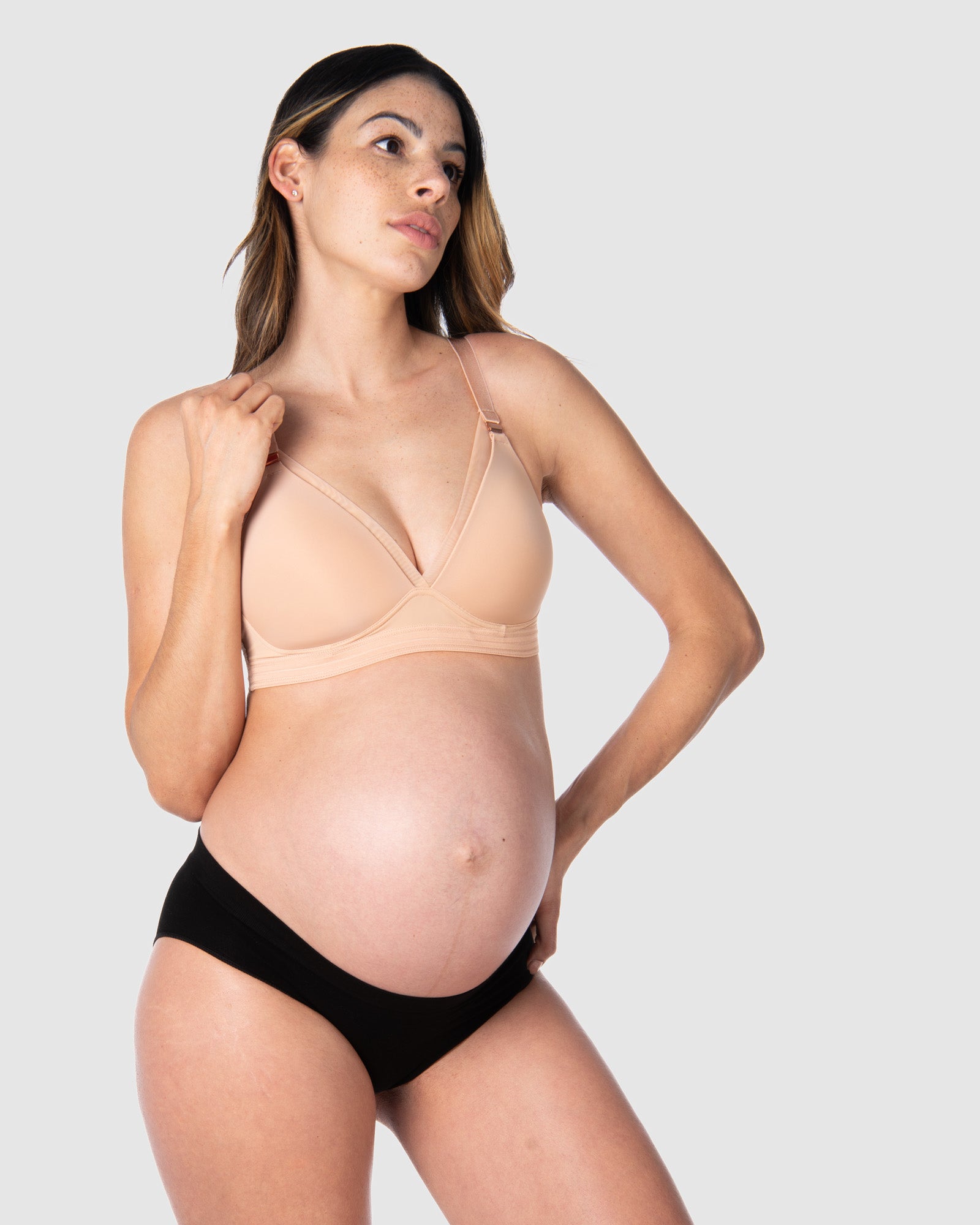 Kami, pregnant mother of 2, showcasing the full-body view of Hotmilk Uk&#39;s Ambition T-Shirt Wirefree nursing and maternity bra in shell, thoughtfully crafted for maternity, nursing, and breastfeeding comfort